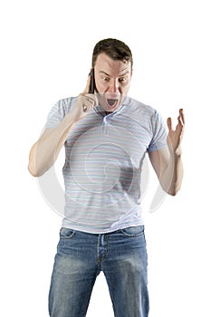Angry man shouting talking on a mobile phone on a white
