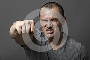 Angry man shows his fist