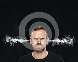 Angry man with smoke coming out from his ears.