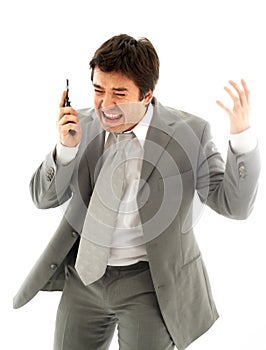 Angry Man in Suit with Mobile Phone