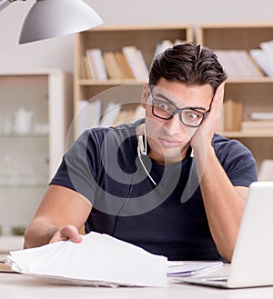 Angry man with too much paperwork to do