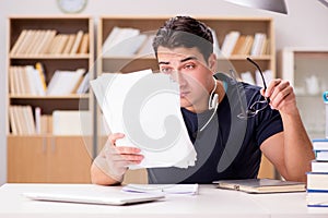 The angry man with too much paperwork to do