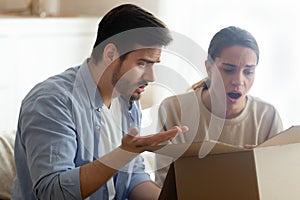 Angry man and woman annoyed by bad delivery service