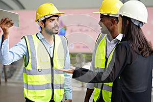 angry man coworker engineer argued with colleague while work outside the workplace photo