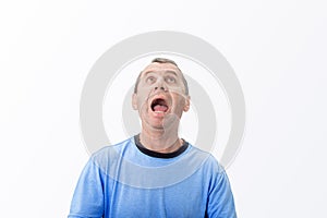 Angry middle aged man screaming yelling isolated over white background. Rage emotion middle aged man .Negative human emotion