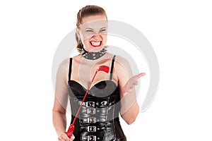 Angry mistress with a whip in hand