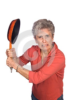 Angry mother swinging a frying pan