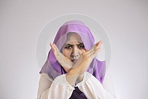 Angry Muslim Woman Shows Stop Sign Crossed Arms gesture