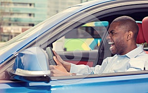 Angry off aggressive young man driving car shouting