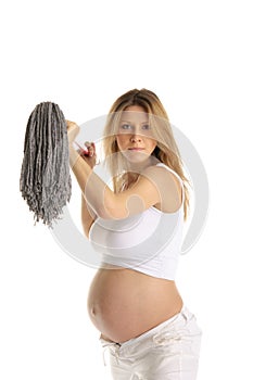 Angry pregnant woman with mop