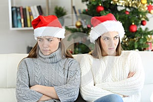 Angry roommates or sisters in christmas photo