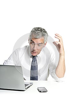 Angry sad senior gray hair businessman laptop