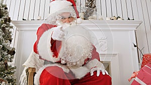 Angry Santa cursing and threatening with a fist