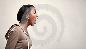 Angry screaming african american woman photo