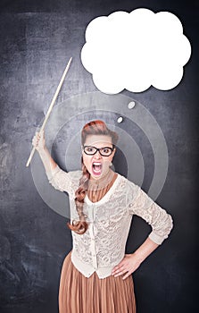 Angry screaming teacher with pointer on blackboard background