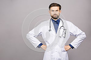 Angry serious male doctor looking at you with stethoscope around his neck, serious face