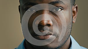 Angry serious man face close up headshot african american 30s businessman worker employee salesman adult ethnic male