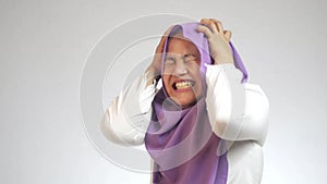 Angry stressed muslim businesswoman shows mad insanity gesture