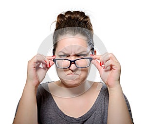 Angry strict woman wears glasses, grimace portrait photo