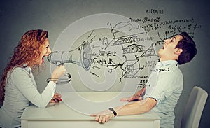 Angry teacher with megaphone shouting at scared student blown away by wave of science formulas