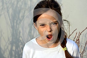 Angry teenager girl photo