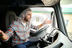 Angry truck driver shouting in his vehicle