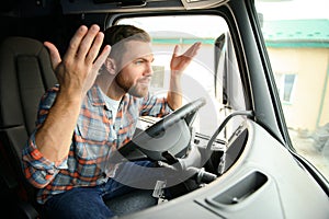 Angry truck driver shouting in his vehicle