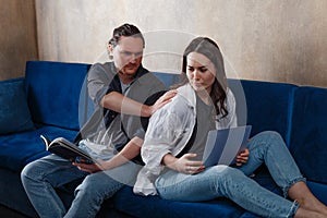 Angry, unhappy young couples, ignoring each other without looking at each other after a family fight or quarrel