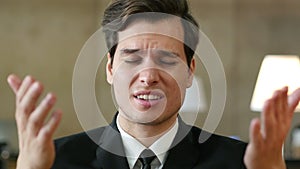 Angry Unsatisfied Businessman Talking with Camera