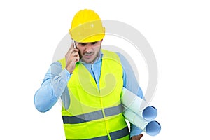 Angry upset young construction engineer yeling at the phone