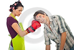 Angry wife boxing husband