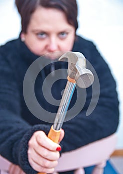 Angry wife with hammer