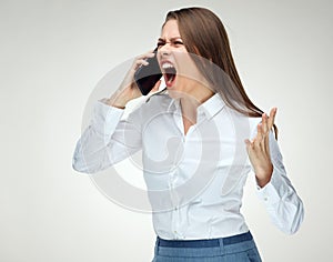 Angry woman boss shouting with phone