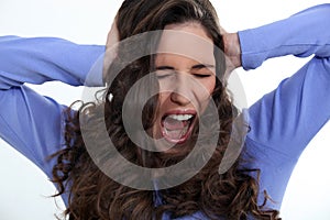 Angry woman with curly hair