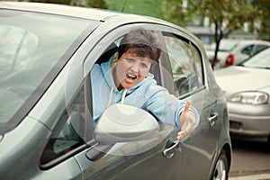 Angry Woman Drives the Car and Crying