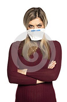 Angry woman with face medical mask
