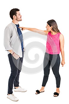 Angry Woman Frowning On Man In Studio
