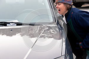 Angry woman gets a parking ticket