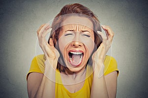 Angry woman screaming hysterical photo