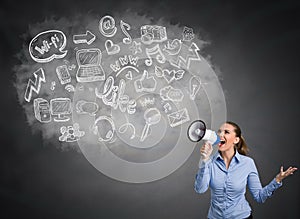 Angry woman shouting with cloud of multimedia icons