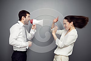 Angry woman shouting at the man