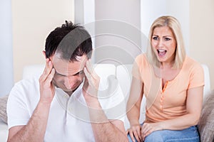 Angry woman shouting at man