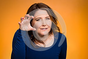 Angry woman, threatening someone with her claws nails