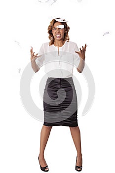 Angry woman throws ripped up papers in the air.