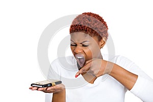 Angry woman yelling while on mobile phone