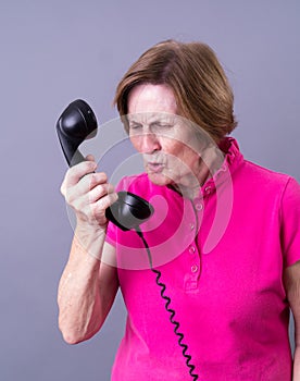 Angry Women with Vintage Telephone