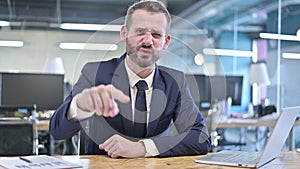 The Angry Young Businessman Screaming on Camera in Office