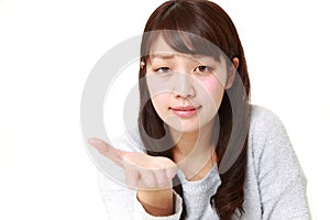 Angry young Japanese woman requests something