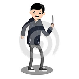 Angry young man with a knife. The Street Crime. A criminal guy offender.