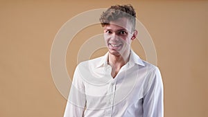Angry young man in white shirt